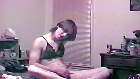 Horny brunette in lingerie shows off her body in a solo