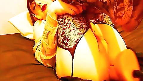 Brunette with a nice body is fucking her asshole with a dildo