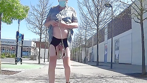 Mature tramp plays with her ass while naked outdoors